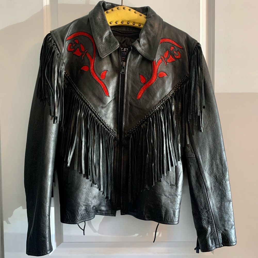 Black motorcycle jacket with fringe. Sz XL. Zip out liner and zippers on sleeves
